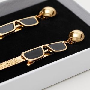 MOSCHINO tv HM SOLD OUT gold sunglasses earrings